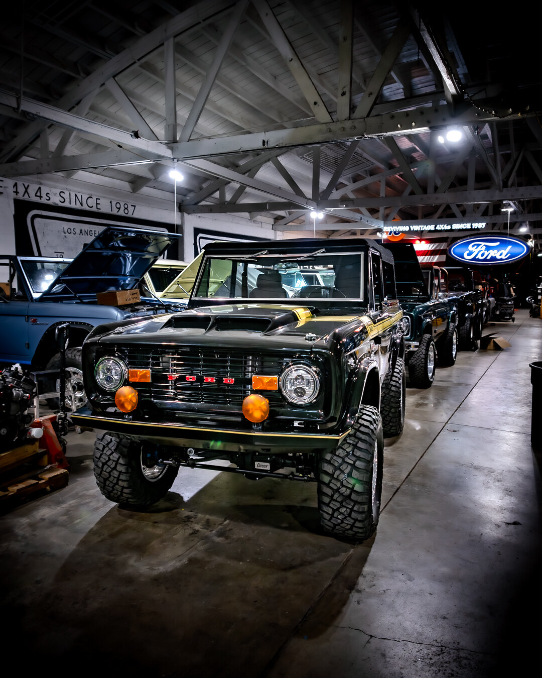 Vintage Ford Bronco photographed inside the ASC 4x4 shop